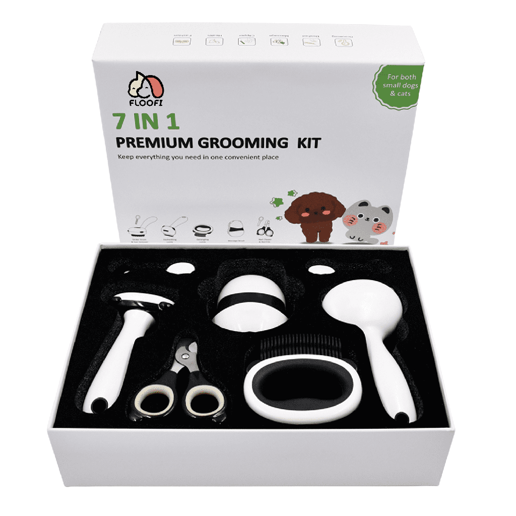 Pet grooming kit from floofi: Brushes, combs, nail clipper, nail filer and massage brush.